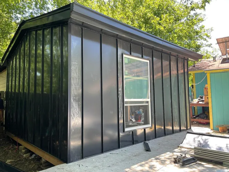 Black standing seam metal wall panels for Roof Inspection in Glastonbury