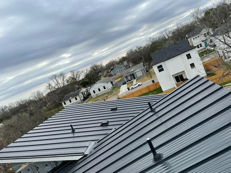 Standing seam metal roof panels with vents for Skylight Repair in Glastonbury